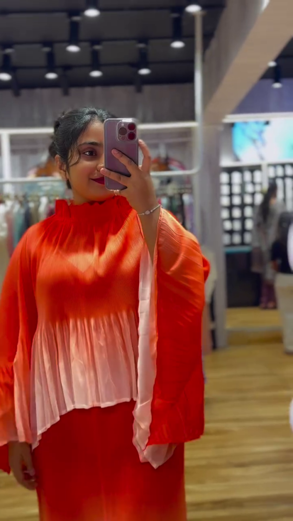 "Fiery Ombre Red to Peach Pleated Maxi Co-Ord Set with Flowing Cape Sleeves and High Ruffled Neck – Luxe Crepe Satin Blend with Fluid Movement for Festive, Resort, or Statement Wear 🌅👑" - Image 2