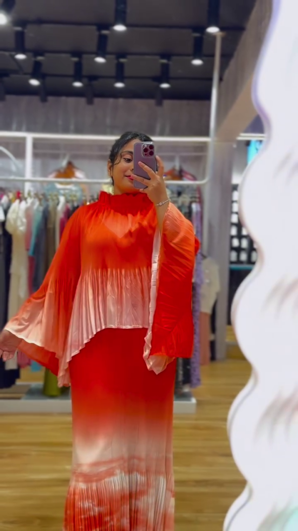 "Fiery Ombre Red to Peach Pleated Maxi Co-Ord Set with Flowing Cape Sleeves and High Ruffled Neck – Luxe Crepe Satin Blend with Fluid Movement for Festive, Resort, or Statement Wear 🌅👑" - Image 3
